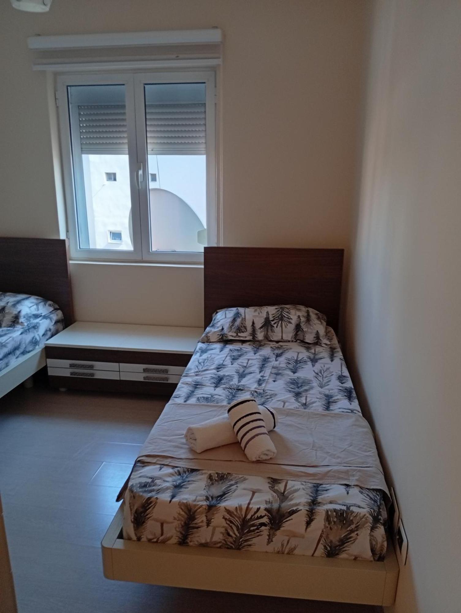 New 9 * Tirana